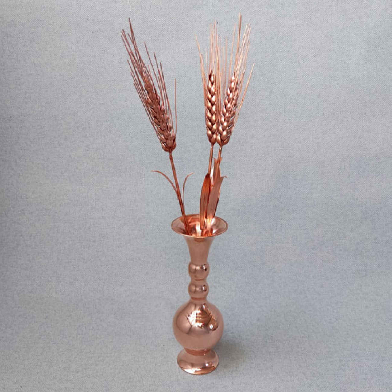 Set of Four Persian Decorative Copper Vases, Featuring the Ball Model with Copper Flowers for a Coordinated Arrangement