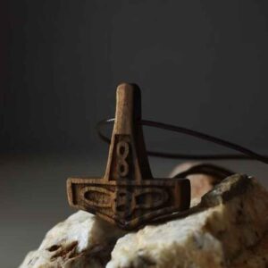 Hand-Carved Wooden Pendant – Infinity Pattern Design