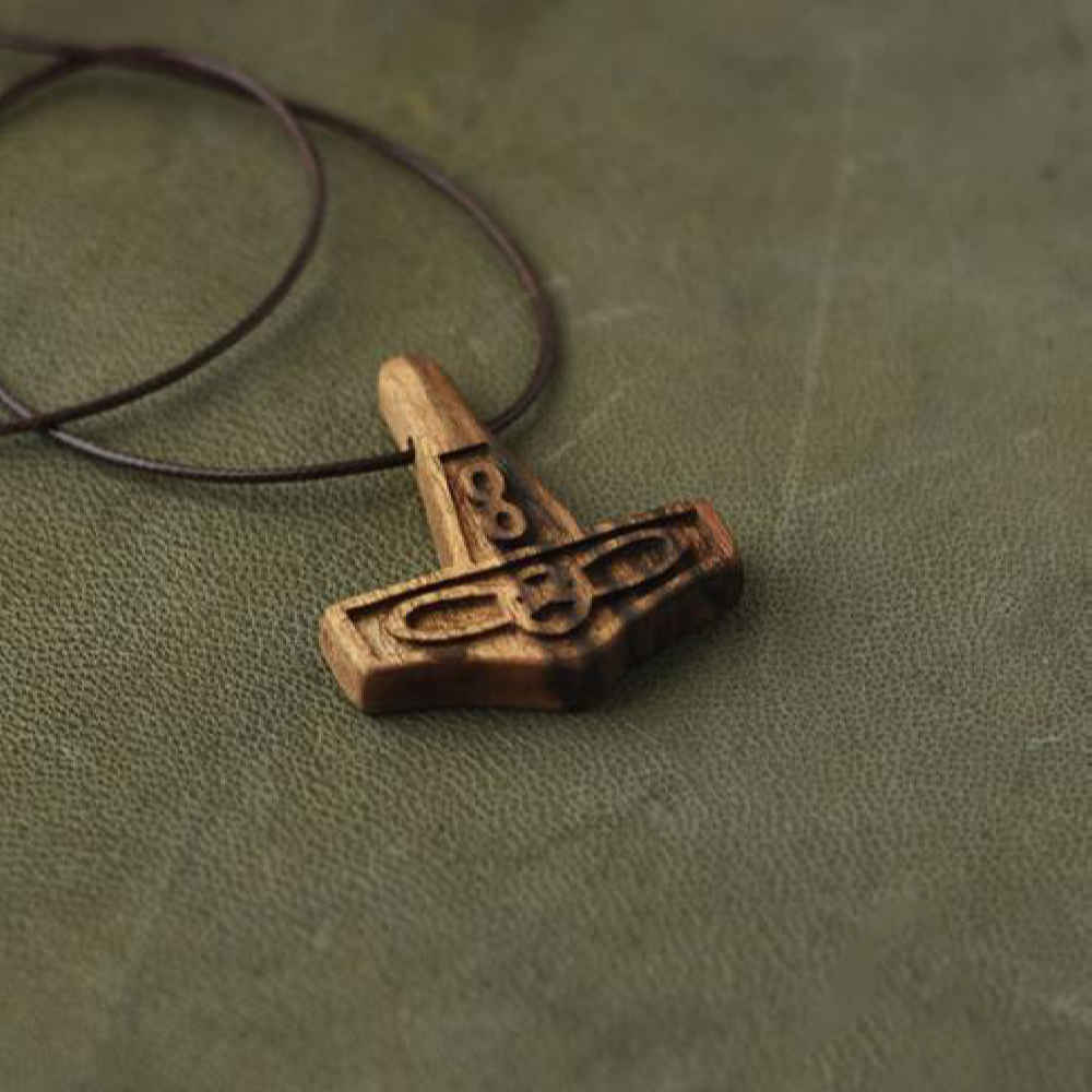 Hand-Carved Wooden Pendant – Infinity Pattern Design