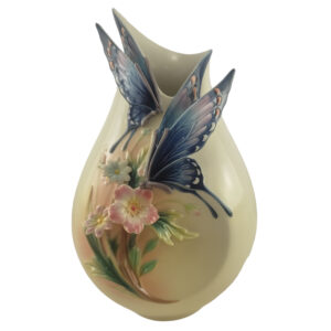 Decorative Porcelain Vase in a Pitcher Shape, Adorned with a Beautiful Butterfly and Flower Design for a Modern Look