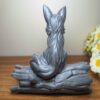 Decorative Sitting Fox on Tree Figurine - Charming Wildlife Sculpture