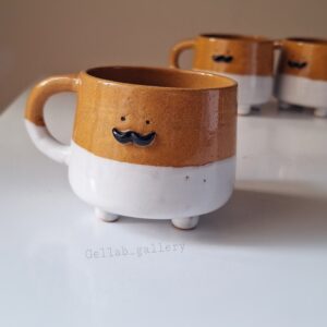 Artistic Handcrafted Ceramic Mug – Elegant Brown Design