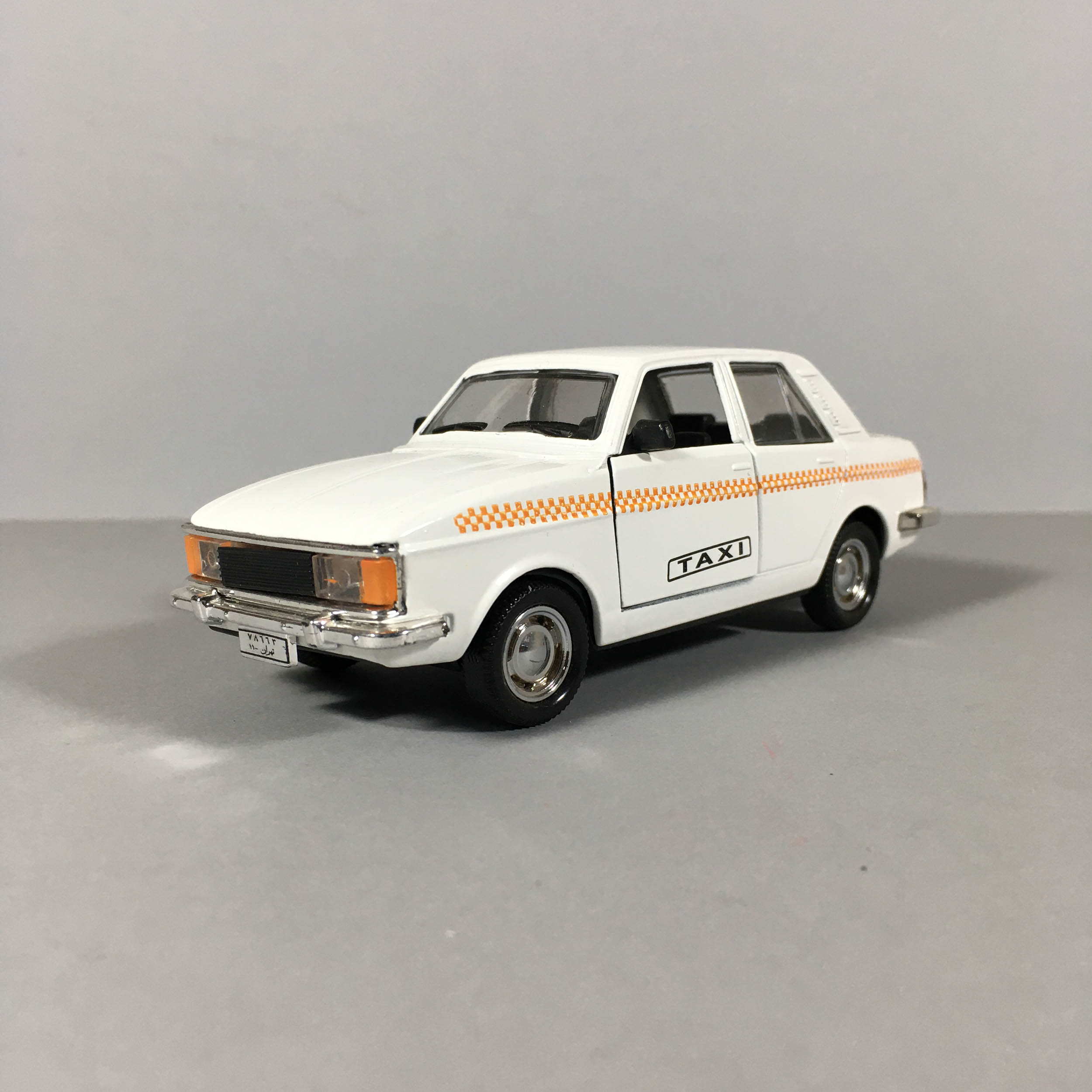 Elegant Paykan Iconic Iranian Toy Car in Taxi Form – 1966 Hillman Hunter