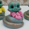 Adorable Snake Figurines with Bows for Nowruz 1404