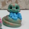 Adorable Snake Figurines with Bows for Nowruz 1404