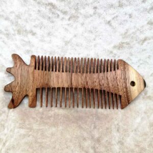 Rustic Hand-Carved Wooden Comb with Intricate Fish Design