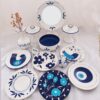 Symbolic Beauty A Hand-Painted Haft Seen Set with Floral, Bird & Evil Eye Motifs Set of 12