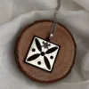 Derafsh-e Kaviani & Shahbaz Stainless Steel Necklace – Cultural Symbol Jewelry Piece