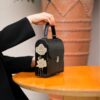 Handcrafted-Wooden-Leather-Bag-Featuring-Hand-Painted-Embossed-Flowers-–-A-Stylish-Choice-for-Parties-4