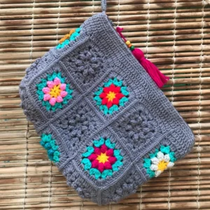 Handmade Crochet Granny Square Handbag – Colorful Floral Motif with Zipper Closure and Tassel Detail