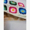 Handmade-Crochet-Tassel-Handbag-with-Vibrant-Flower-Design-–-Featuring-Zipper-Closure-and-Lined-Inside2