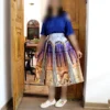 Pleated-Midi-Satin-Skirt-with-Persepolis-Inspired-Motifs-and-Architectural-Band-Design-1