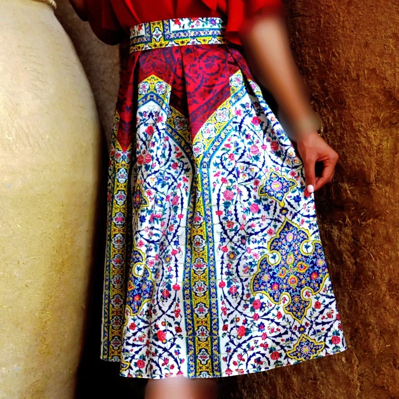 Pleated Midi Satin Skirt with Persian Floral Motifs in Pink and Yellow on White