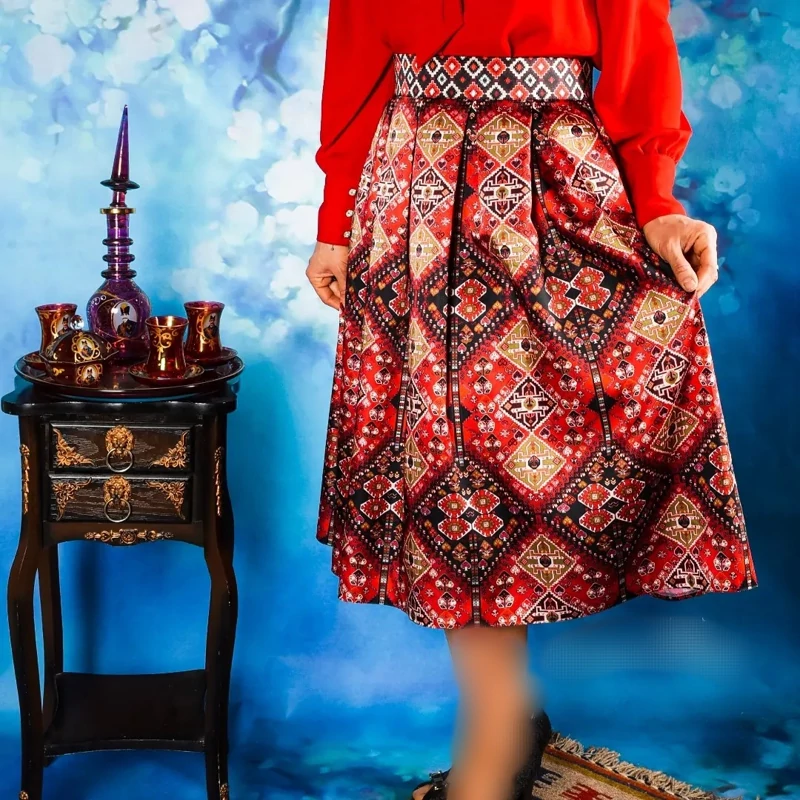 Pleated Midi Satin Skirt with Red Persian Kilim Motifs and Tribal Geometry