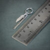 Stainless-Steel-Asymmetric-Hoop-Earrings-with-Feather-Charm-–-Minimal-Decorative-Pair-3
