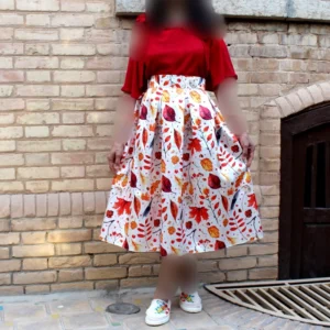 White Midi Pleated Satin Skirt with Autumn Leaf Print and Bold Floral Hem