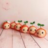 Handmade-Crochet-Orange-Keychain-–-Soft-Yarn-Bag-Charm-with-Green-Leaf-and-White-Blossom2
